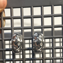 Nolan Miller Silver Tone Oval Huggie Hoop Earrings Clear Round Stones