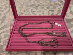Chico’s adjustable, sparkly, silver-black with tassels statement necklace