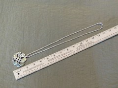 Vintage green four-leaf clover pendent, with silver chain, new without tags