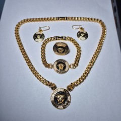 full set of gold plated accessories, versace model