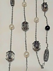Black beads necklaces and earrings. Chunky beads, metal, glass, crystal cage