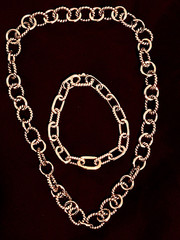 Ladies Silver necklace and bracelet set with twisted prong style