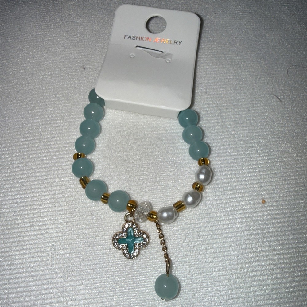 Light Green & white Expandable Bracelet With Dangle Ball And Clover