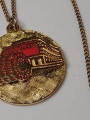Red And Gold Tone Delta Queen Pendant Necklace