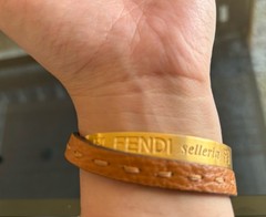 Fendi Gold Plated Interlocking Tan Leather Strap Bracelet With Button Closure