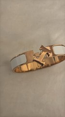 Hermès Clic H bangle bracelet rose gold tone white enamel pre owned w dust bag