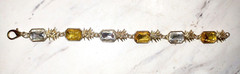Sparkly amber yellow & clear crystals in gold tone pineapples link bracelet