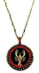 Lovely round Metal Necklace By Michal Negrin Red Crystal Cancer Sign.