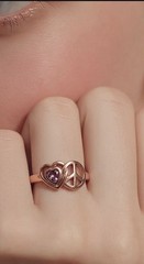 Solid Copper Ring With A Genuine Amethyst stone. Available in sizes 6 thru 9.