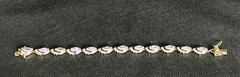 Gold Tone Brass Simulated Amethyst Marquise Rhinestone Tennis Bracelet 7 Inch