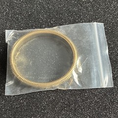 Gold core stretch bracelet by plunder. 7 inch slight stretch layers well with ot