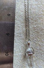 Clear Quartz Crystal Pendant – A Timeless Emblem of Clarity and Energy
