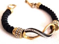 Heidi Daus SUMMER BREEZE Infinity Bracelet Crystal- BLACK Cord – 8″ Excellent