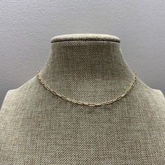 Delicate gold tone elongated oval link chain necklace