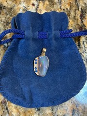 Freeform Semi Black Opal Pendant Gold Casing Sapphire And Diamond Accent